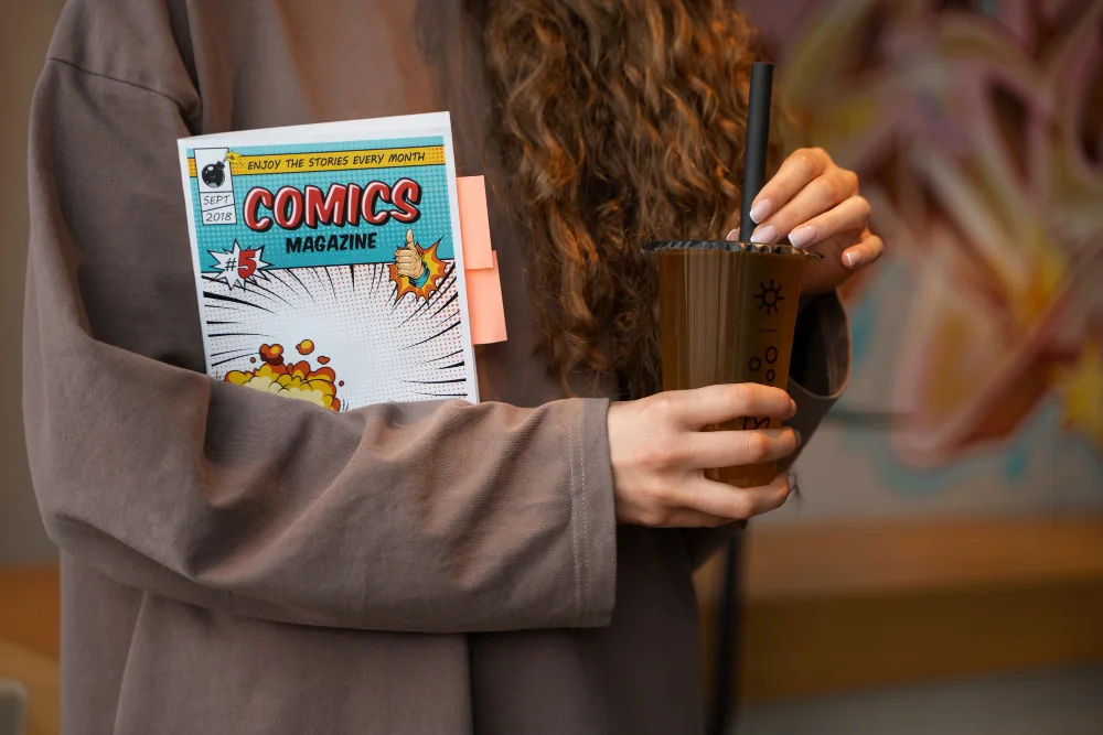 A Person Holds A Freshly Printed Book, Symbolizing The Pod's Ability To Print On Demand.